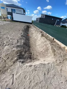 versickerungsanlage-rasenmulde -neubau-lehrte-sievershausen Versickerungsanlage Rasenmulde flach im Neubau bei Lehrte-Sievershausen